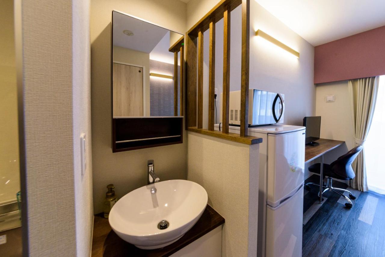 Aparthotel Mrkinjo In Nicas Makishi à Naha Extérieur photo