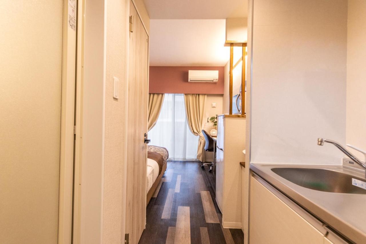 Aparthotel Mrkinjo In Nicas Makishi à Naha Extérieur photo