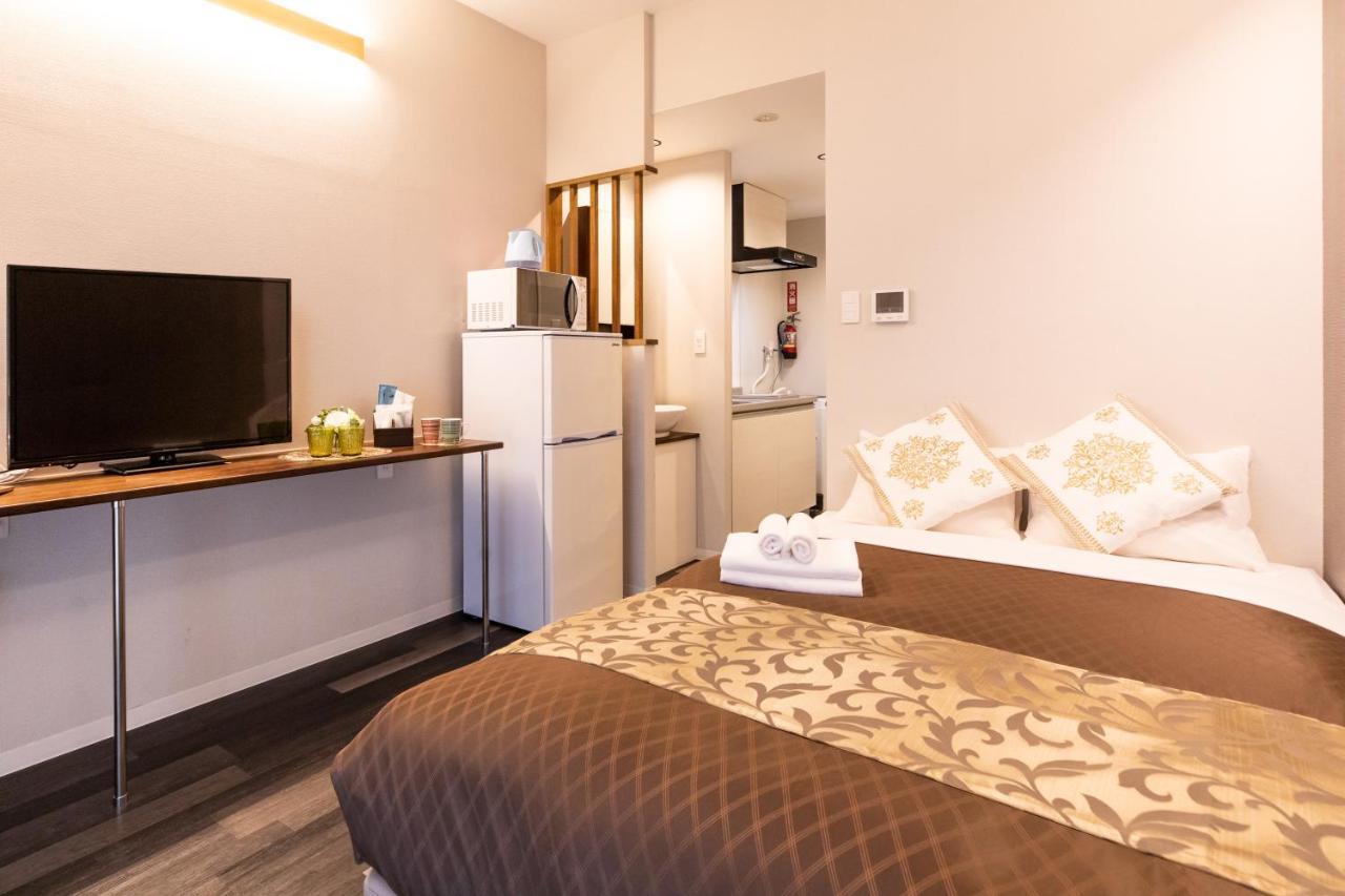 Aparthotel Mrkinjo In Nicas Makishi à Naha Extérieur photo